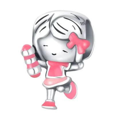 Dije de niña con mancuernas