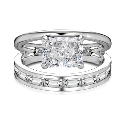 Anillo de plata con gema de corte rectangular enmarcada