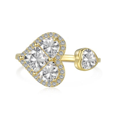 Anillo de oro con corazones envolventes