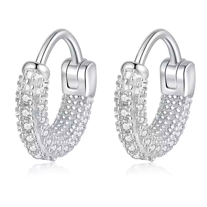 Delicate 925 silver earrings with micro-inlaid moissanite. Subtle sparkle perfect.