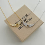 Collar de plata con anillo angelical